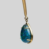 Close product shot of Aeris opal crystal haze teardrop pendant showing stone and gold prong detail.