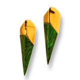 Pair of gold and malachite spike drop earrings on white background