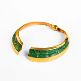 Open-form gold collar necklace with malachite inlay on white background