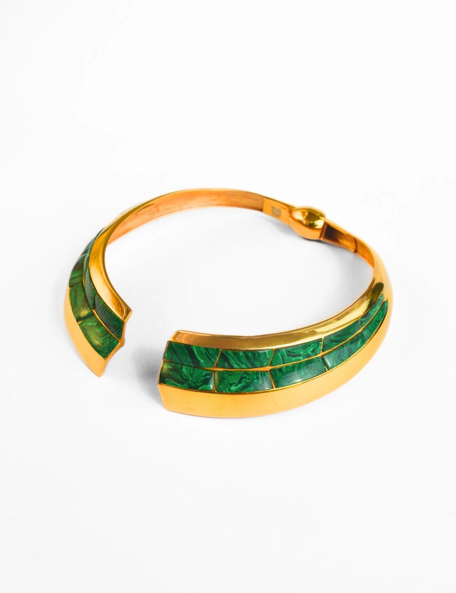Open-form gold collar necklace with malachite inlay on white background