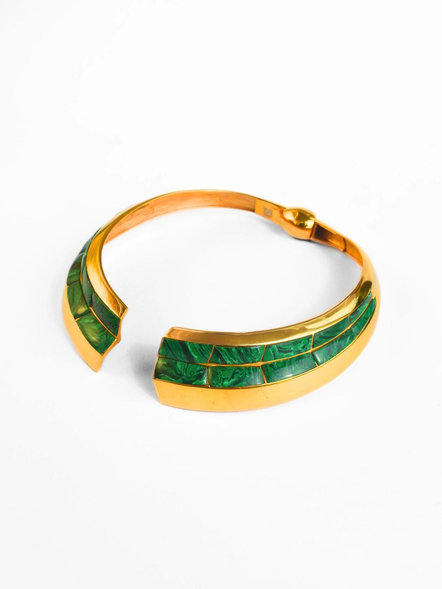 Open-form gold collar necklace with malachite inlay on white background