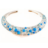 Silver hasli necklace studded with 130+ carats of blue fire opal and moonstone