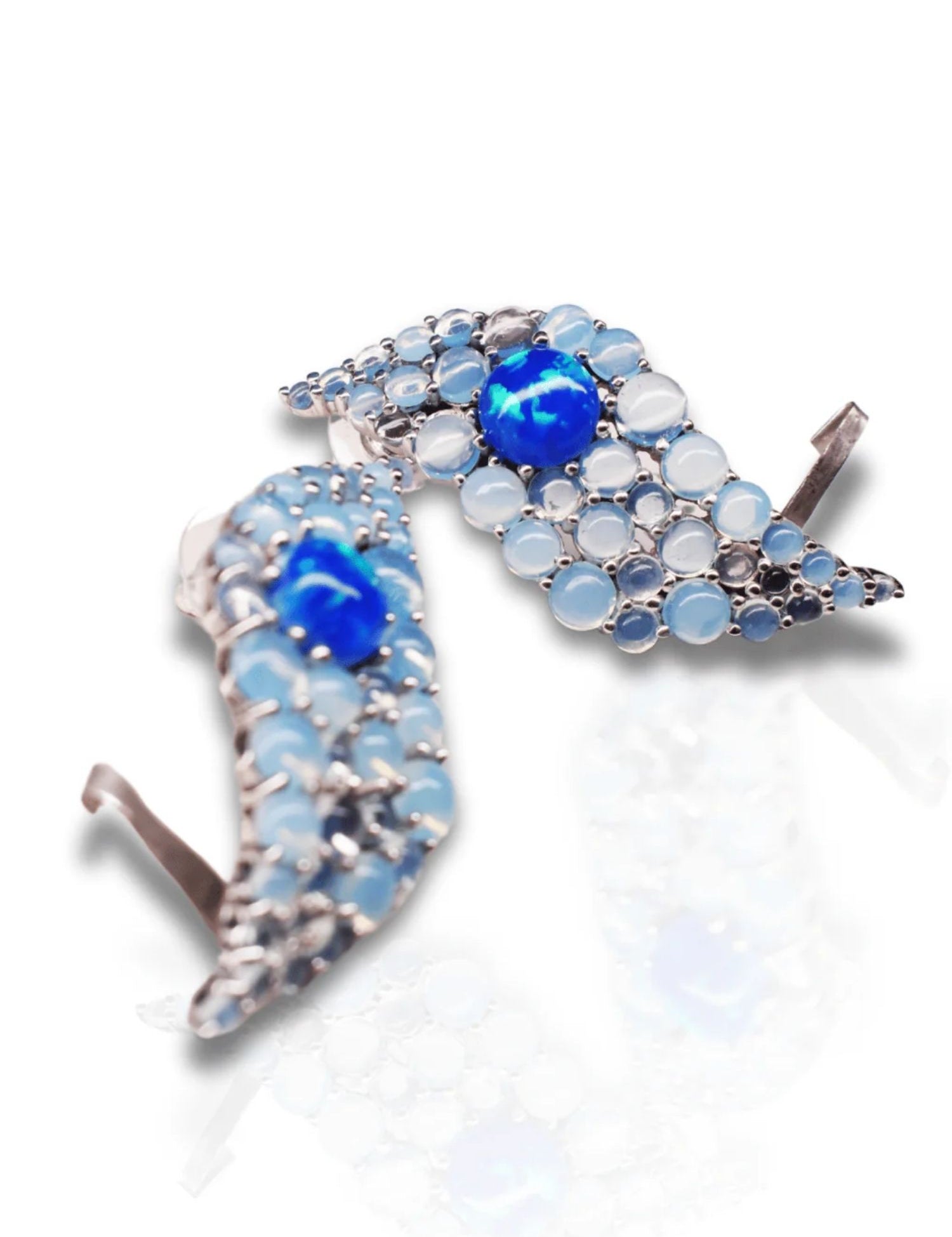Blue opal wave ear cuff with lapis and moonstone on white background