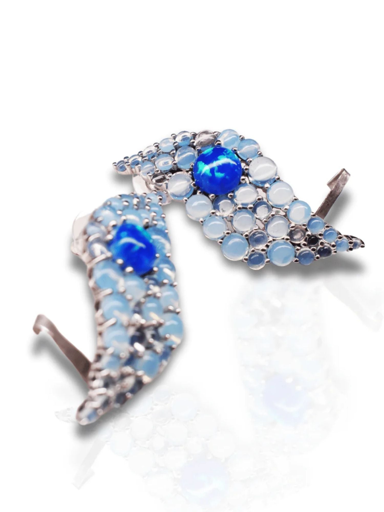 Blue opal wave ear cuff with lapis and moonstone on white background
