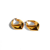 Small gold claw hoop earrings showing angular form on white background