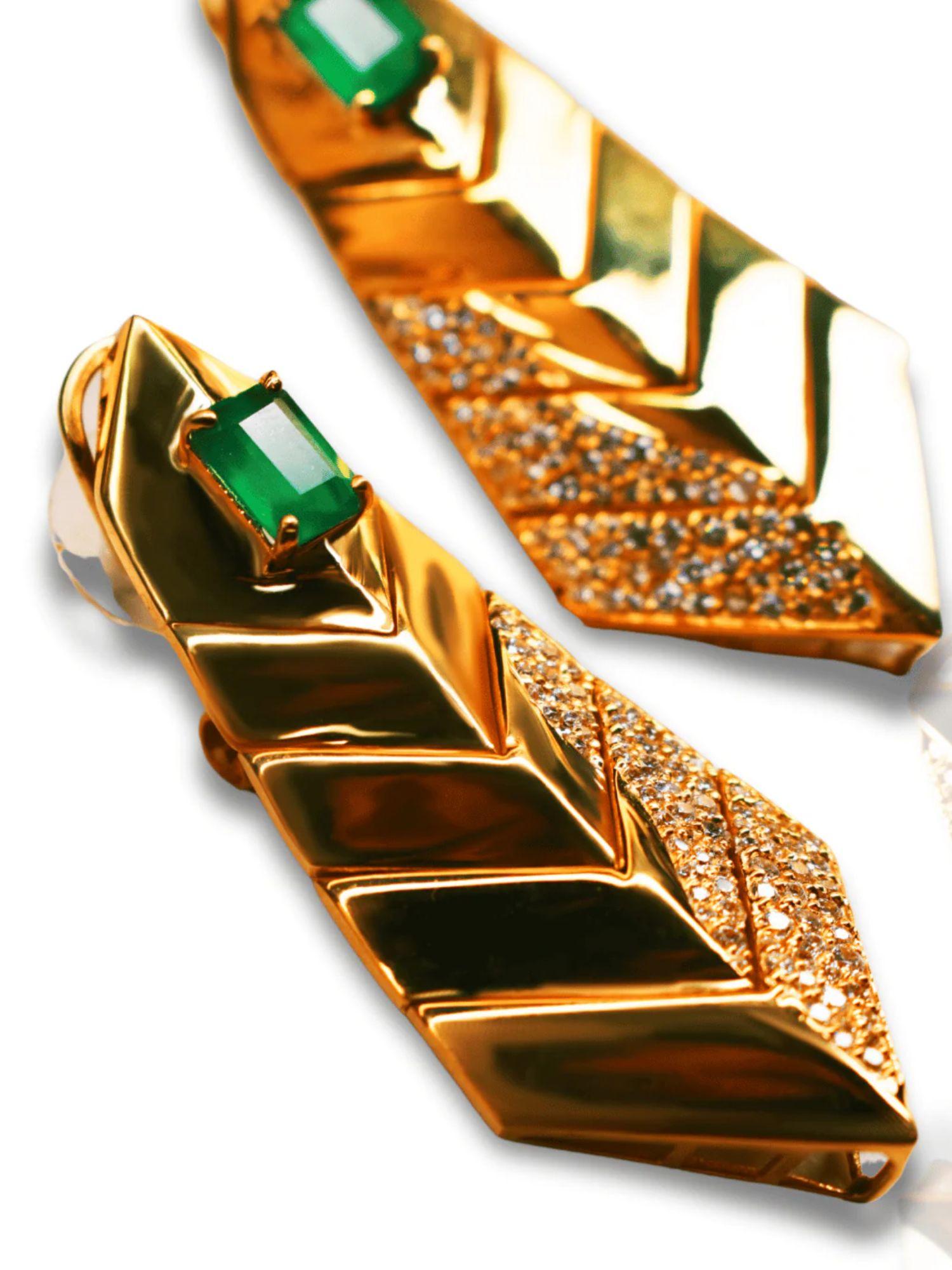 Close-up of green onyx and CZ earrings alongside collar necklace surface