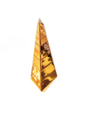 Close-up of triangular gold tie pendant with CZ stone inlay