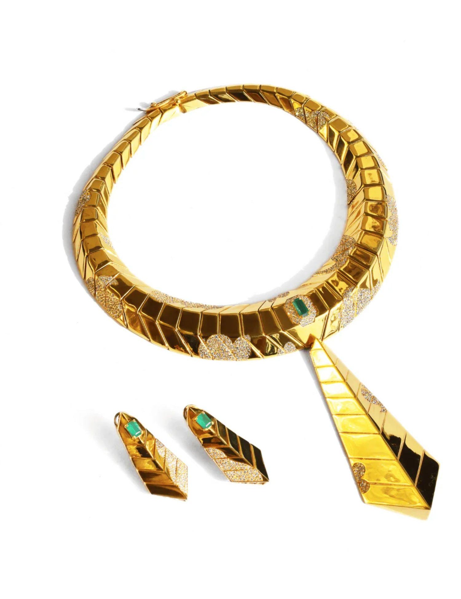 Gold collar necklace set with green onyx and CZ earrings on white background