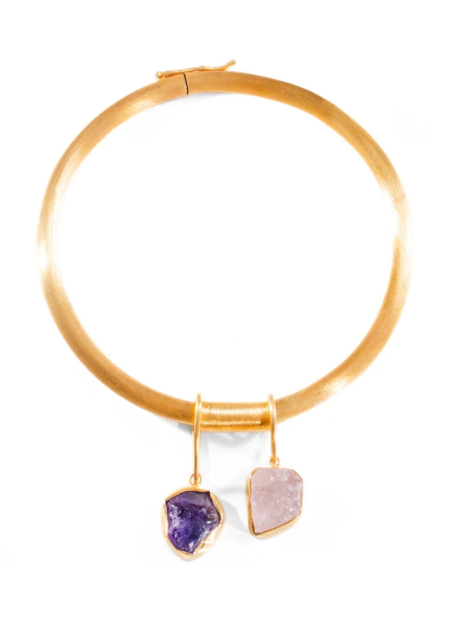 Gold choker bangle with two raw stone charm drops on white background