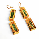 Large gold box drop earrings showing malachite beads inside open compartments