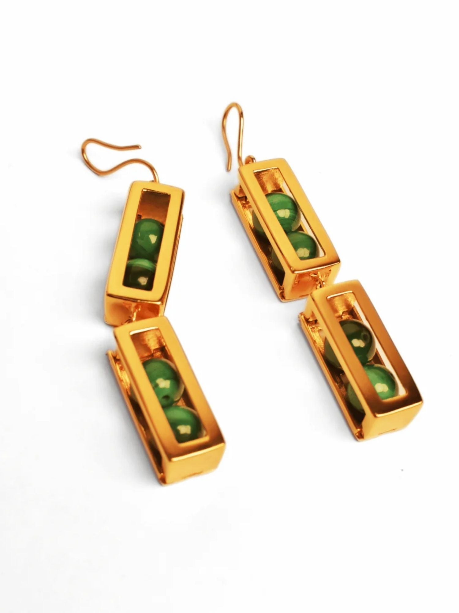 Large gold box drop earrings showing malachite beads inside open compartments