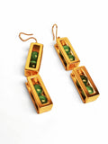 Large gold box drop earrings showing malachite beads inside open compartments