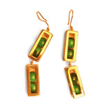 Double-drop large gold box earrings with malachite beads on white background