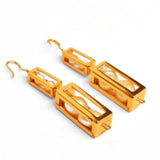 Large gold box drop earrings with pearl beads showing compartment detail