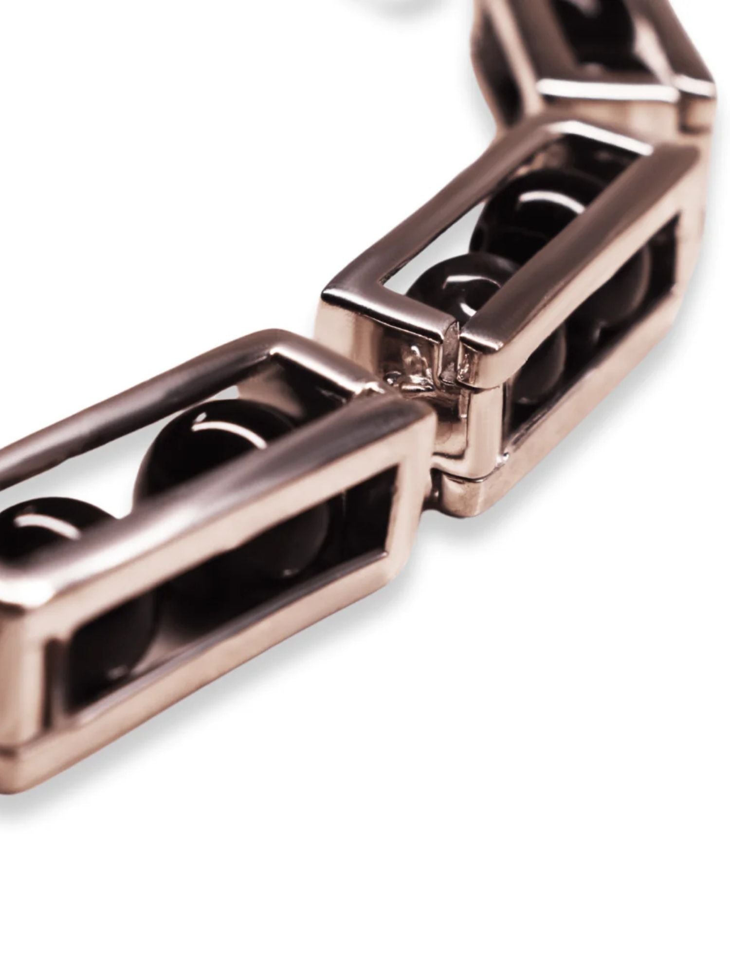 Close detail of large silver box link necklace showing open compartment mechanism