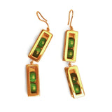 Double-drop gold box link earrings with malachite beads on white background