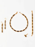 Gold interchangeable box link necklace and earring set with agate beads on white