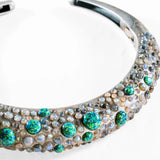 Detail shot of oxidised silver green opal hasli necklace showing stone texture
