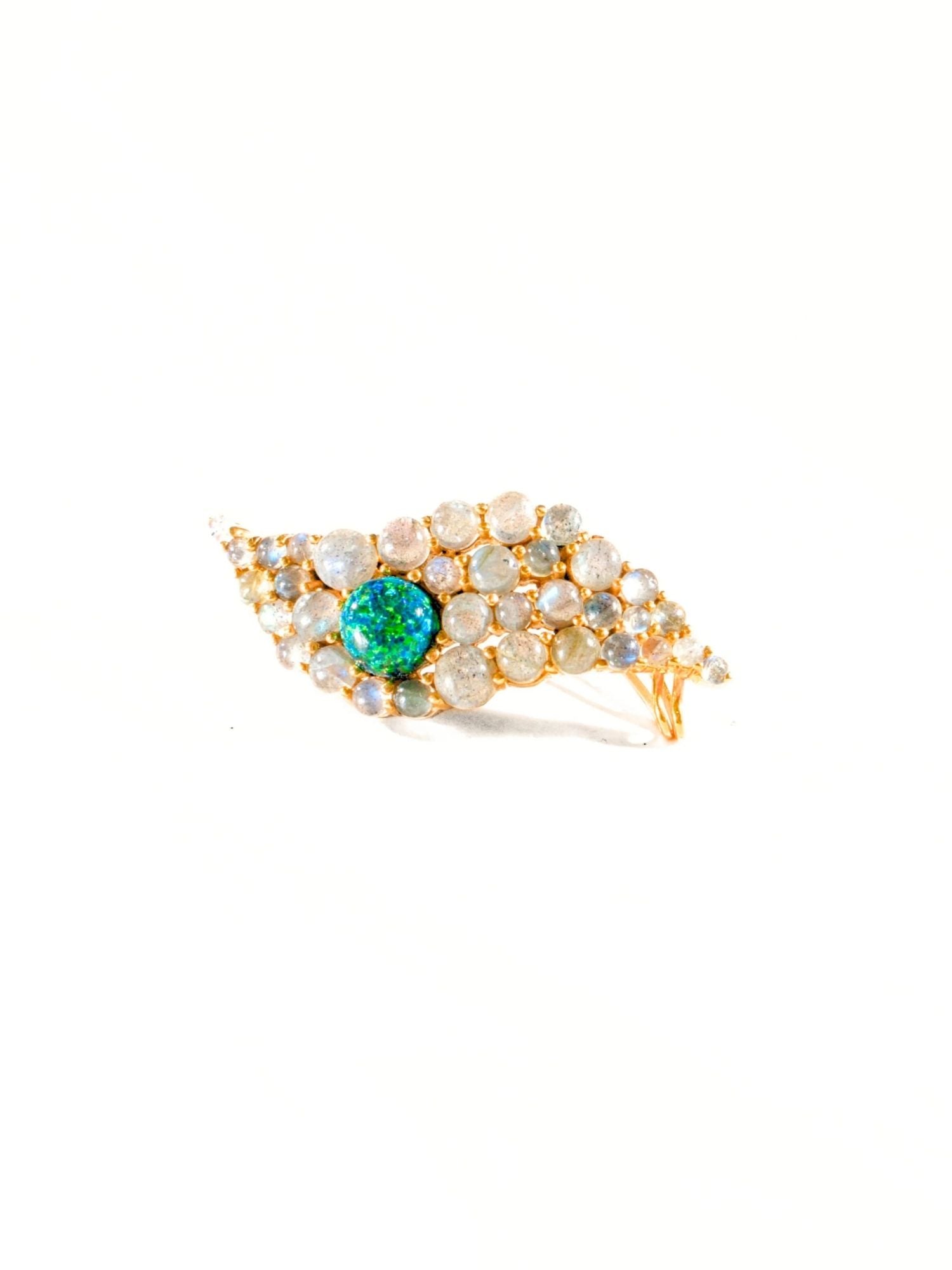 Green fire opal and labradorite wave ear cuff in gold on white background