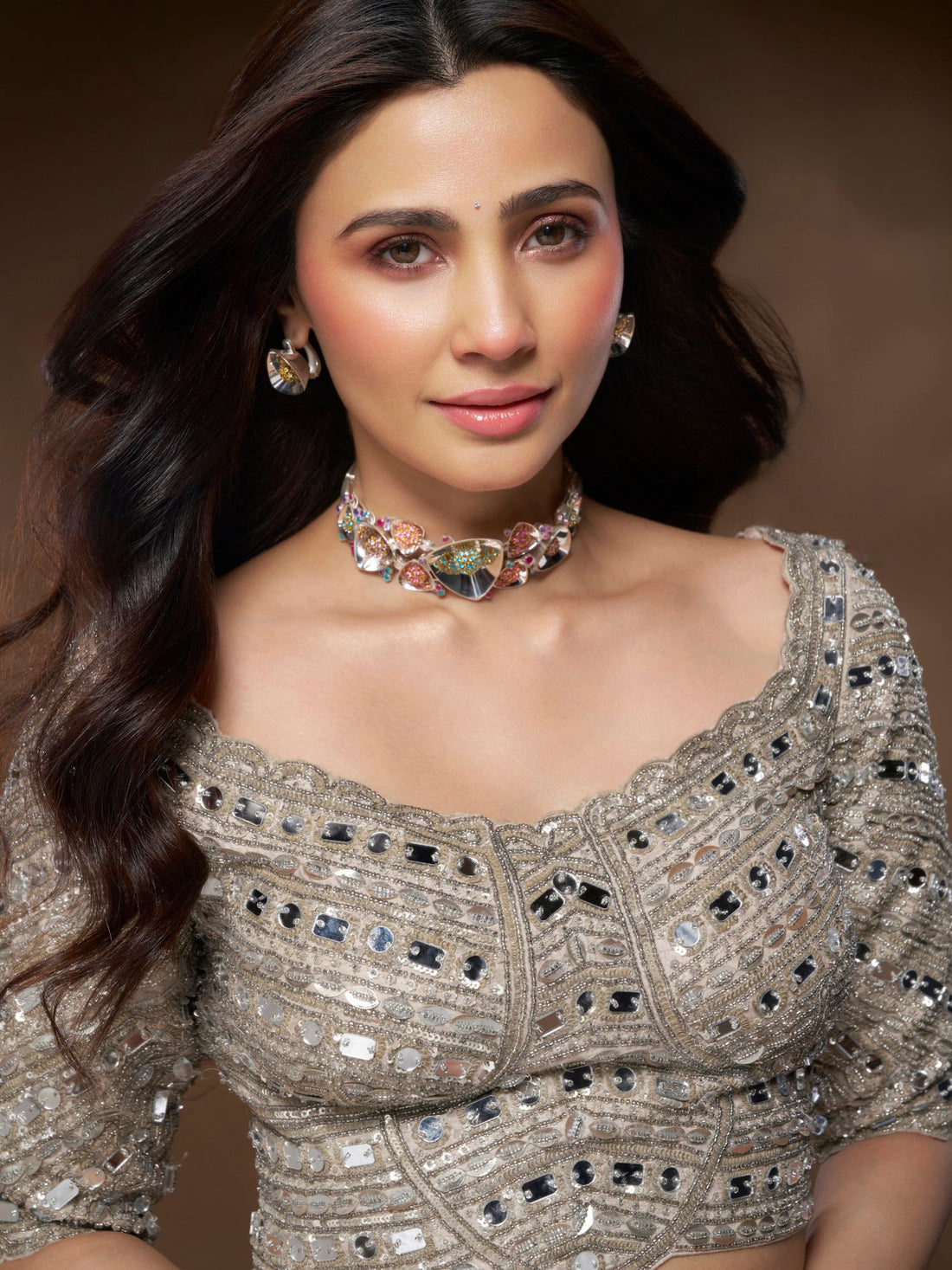 Model wearing sculptural silver Irodori flower motif choker with zircon centres at collarbone