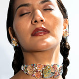 Model wearing Irodori choker and matching earrings together in a confident editorial portrait.