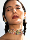 Model wearing Irodori choker and matching earrings together in a confident editorial portrait.