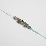 Irodori choker necklace with mixed zircon cluster motifs and coloured stone accents in silver on neutral background.