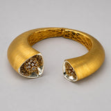 Irodori Double Motif Cuff in 24k gold with CZ-set triangular tip on open recycled silver cuff, three-quarter angle.