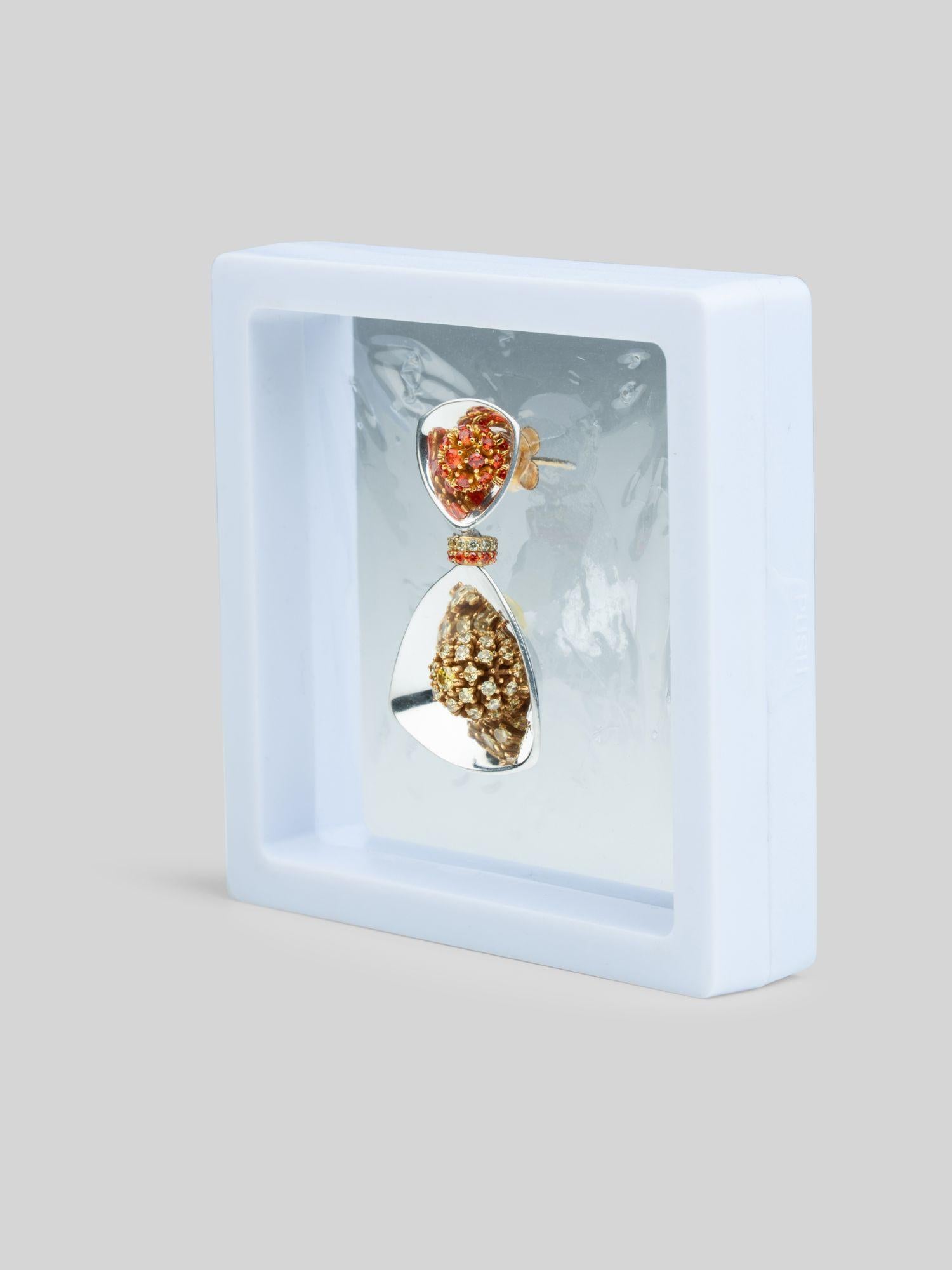 Irodori large drop earring displayed in white shadow box showing full length and stone cluster detail.