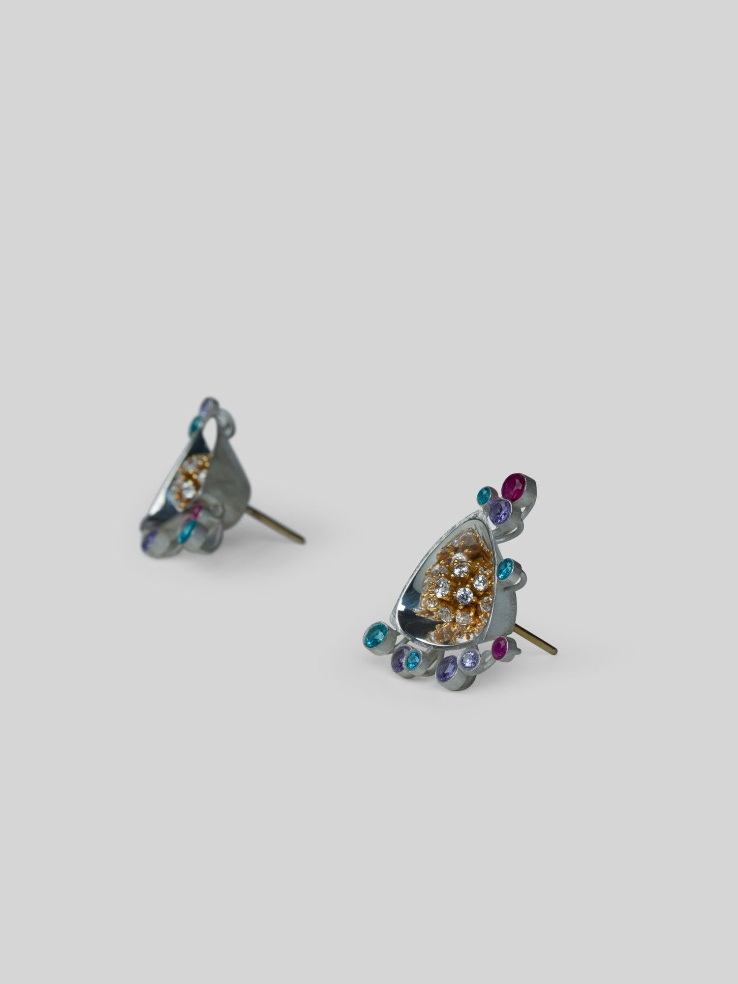 Angled product shot of Irodori Mix earrings showing mixed zircon and coloured stone cluster detail.