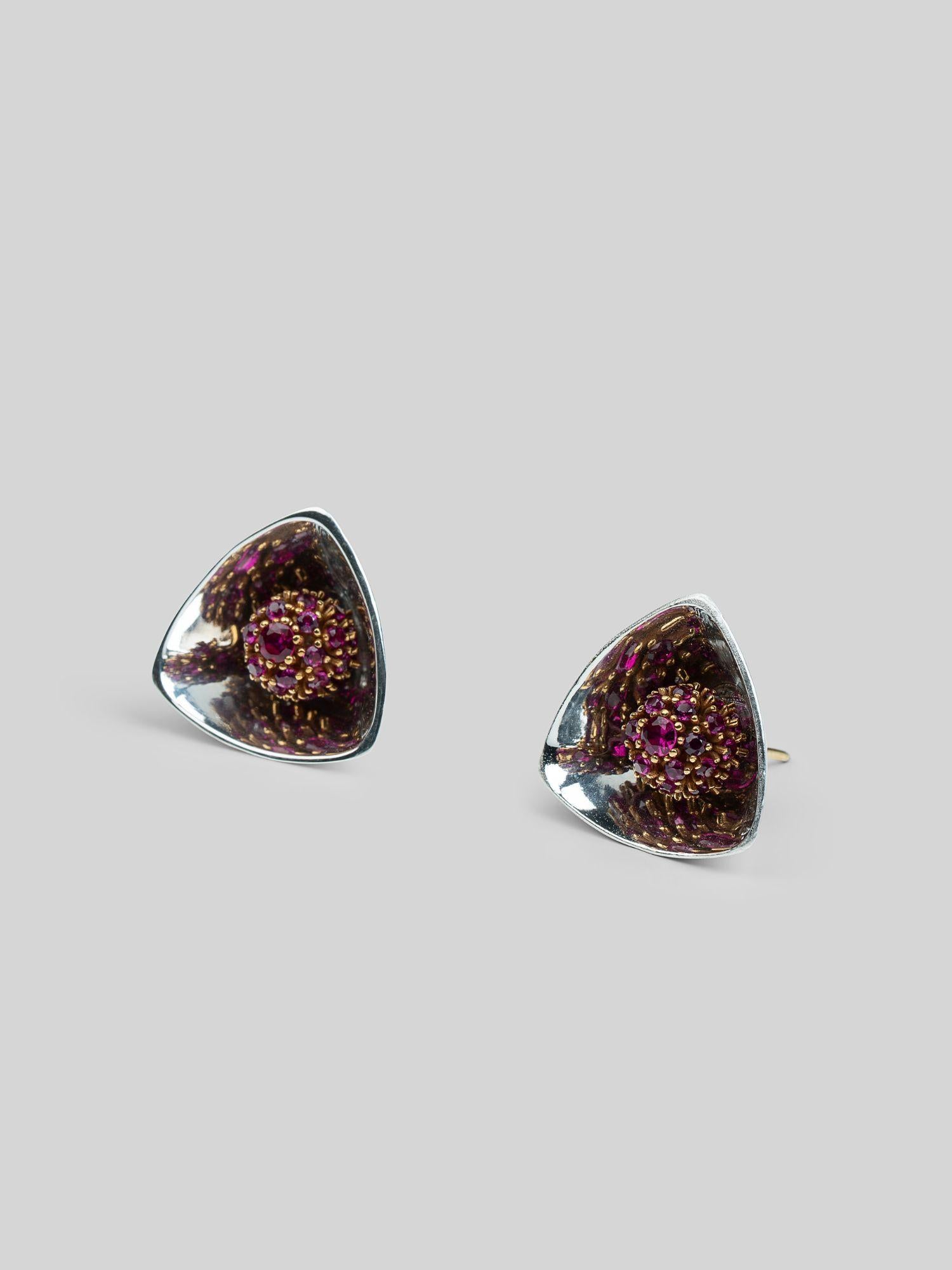 Angled product shot of Irodori small pink zircon triangular stud earrings in polished silver setting.