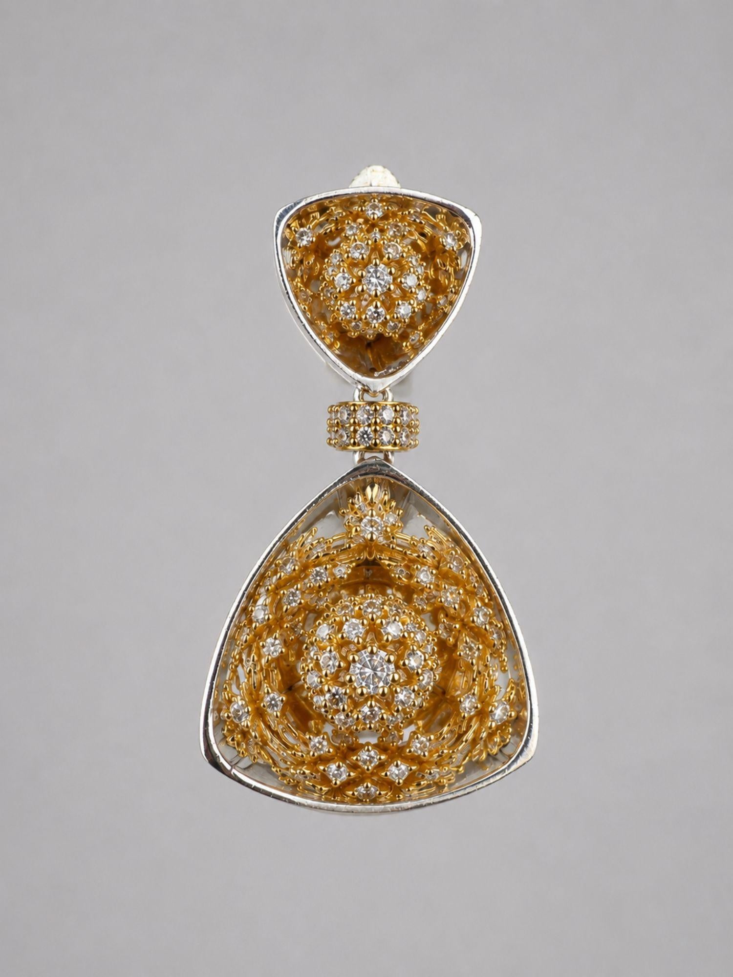 Close detail of MHARI Irodori Mix statement earring, gold zircon kaleidoscope motif on 925 silver