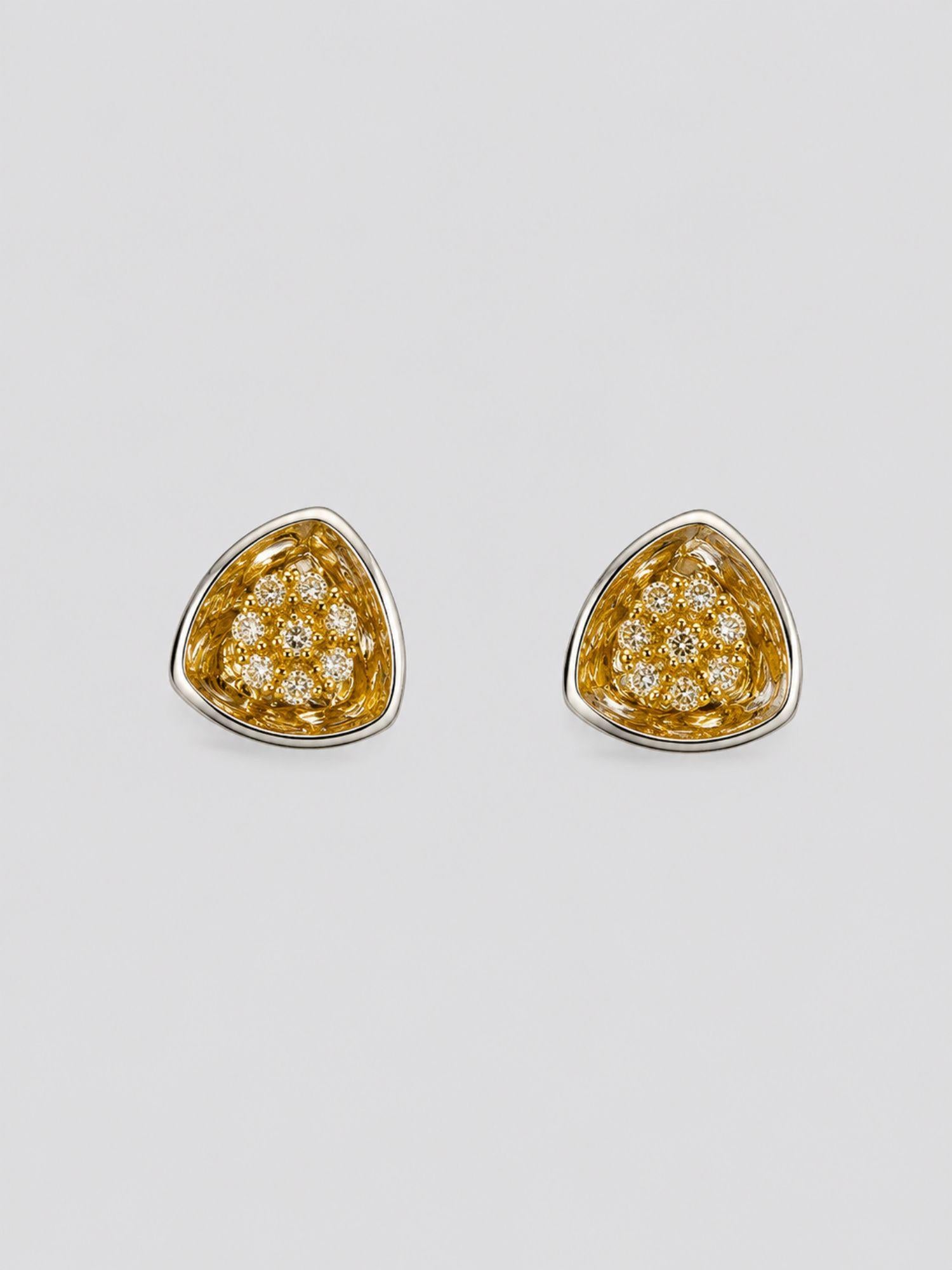 MHARI Irodori Small gold zircon statement earrings on 925 silver, angled front view