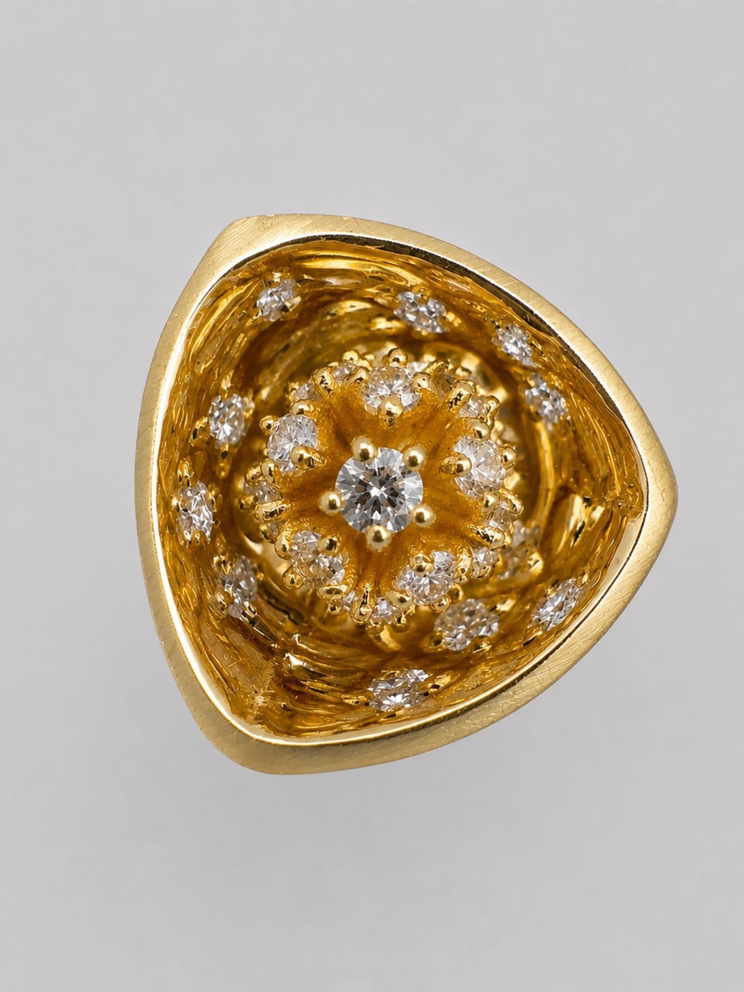 Close detail of MHARI Irodori Small statement earring, gold zircon kaleidoscope on mirror-polished 925 silver