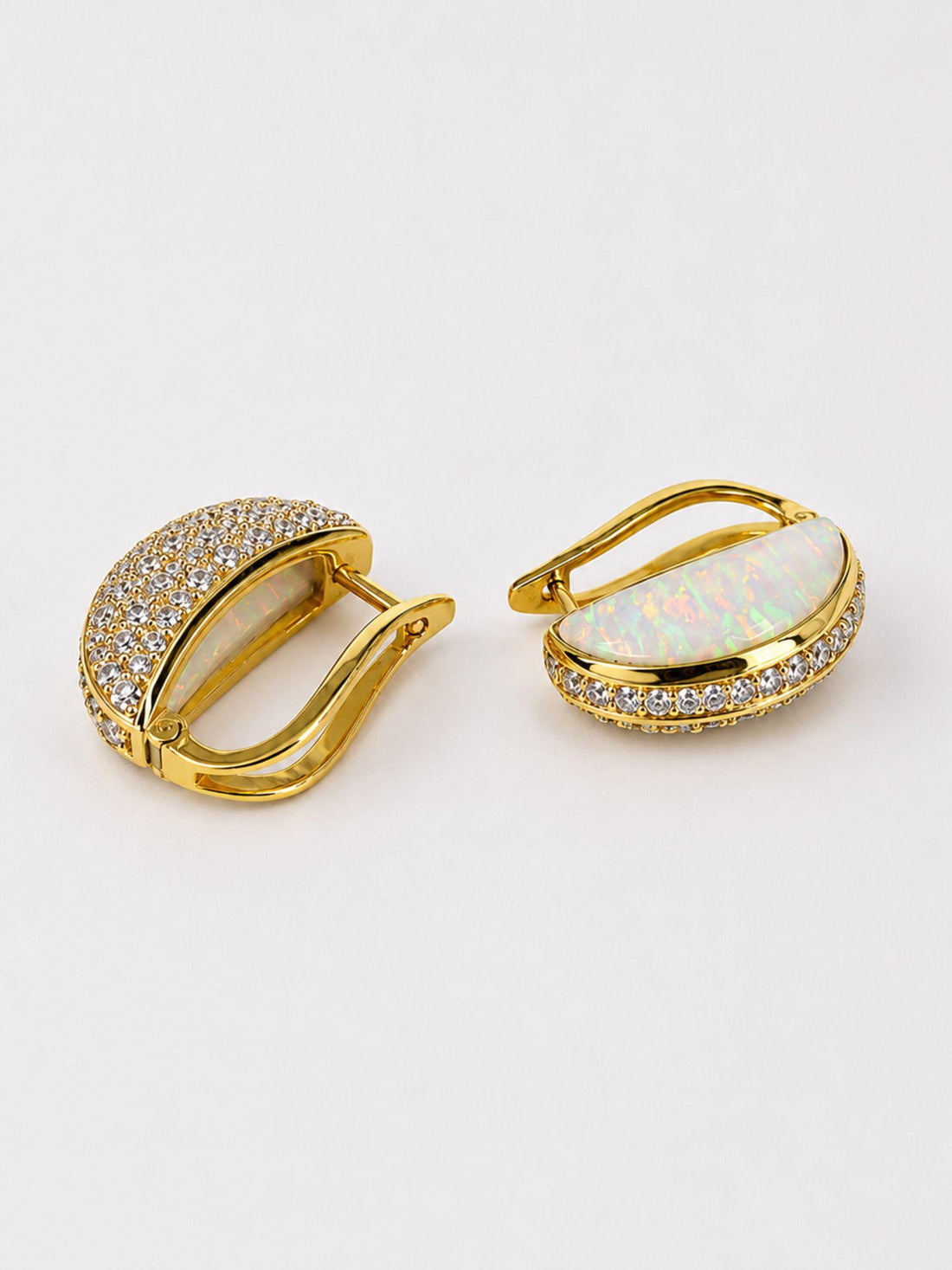 Reversible Opal Perspective earrings showing opal crystal haze face and zircon pavé border in 24k gold.
