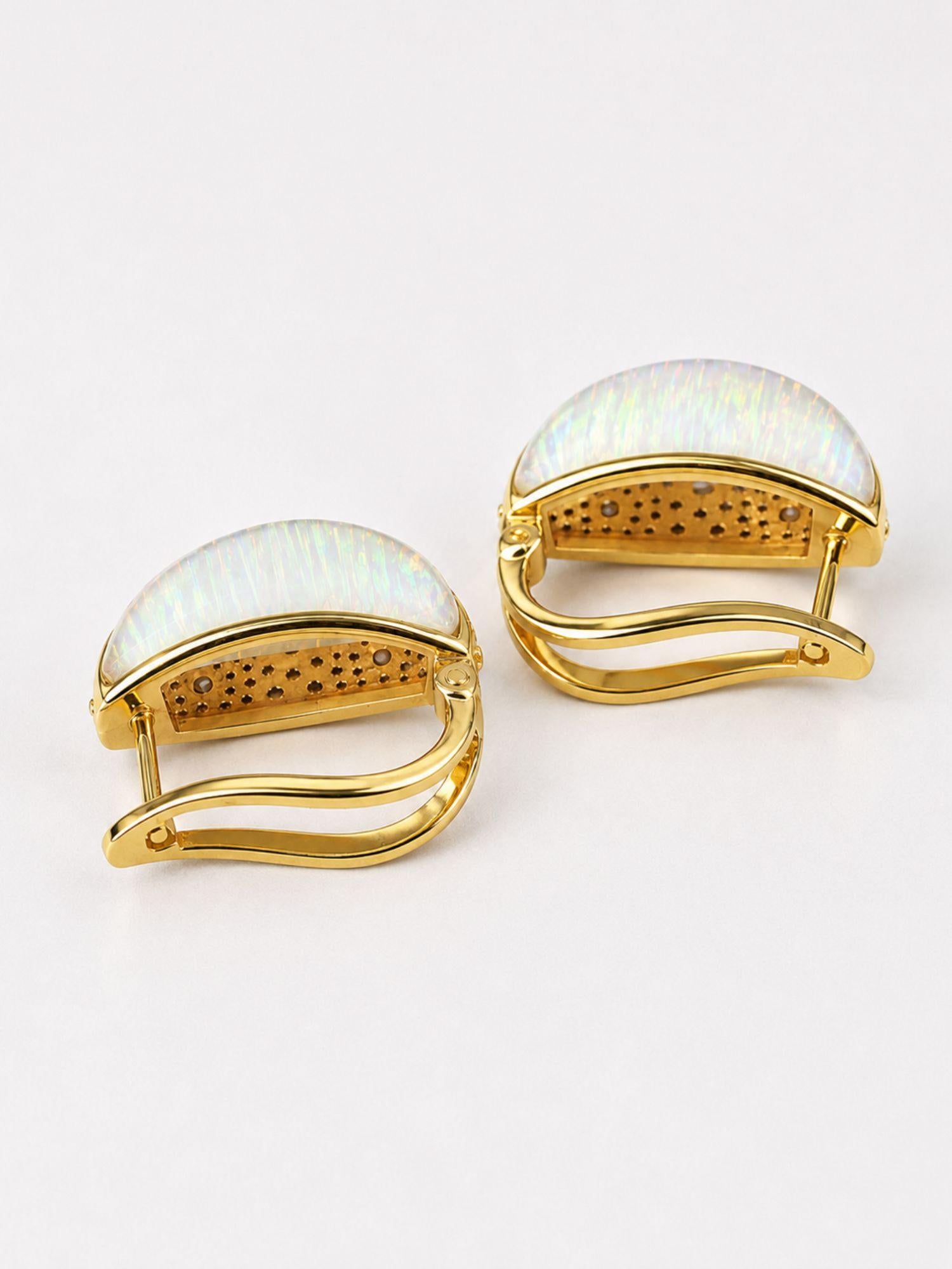  Three-quarter product shot of reversible Opal Perspective earrings in 24k gold on neutral background.