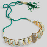 Opal Perspective necklace with opal crystal haze stones and green cord in 24k gold on neutral background.
