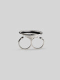 Top-down view of Orbis ring showing full black enamel spiral disc with zircon border in silver rhodium.