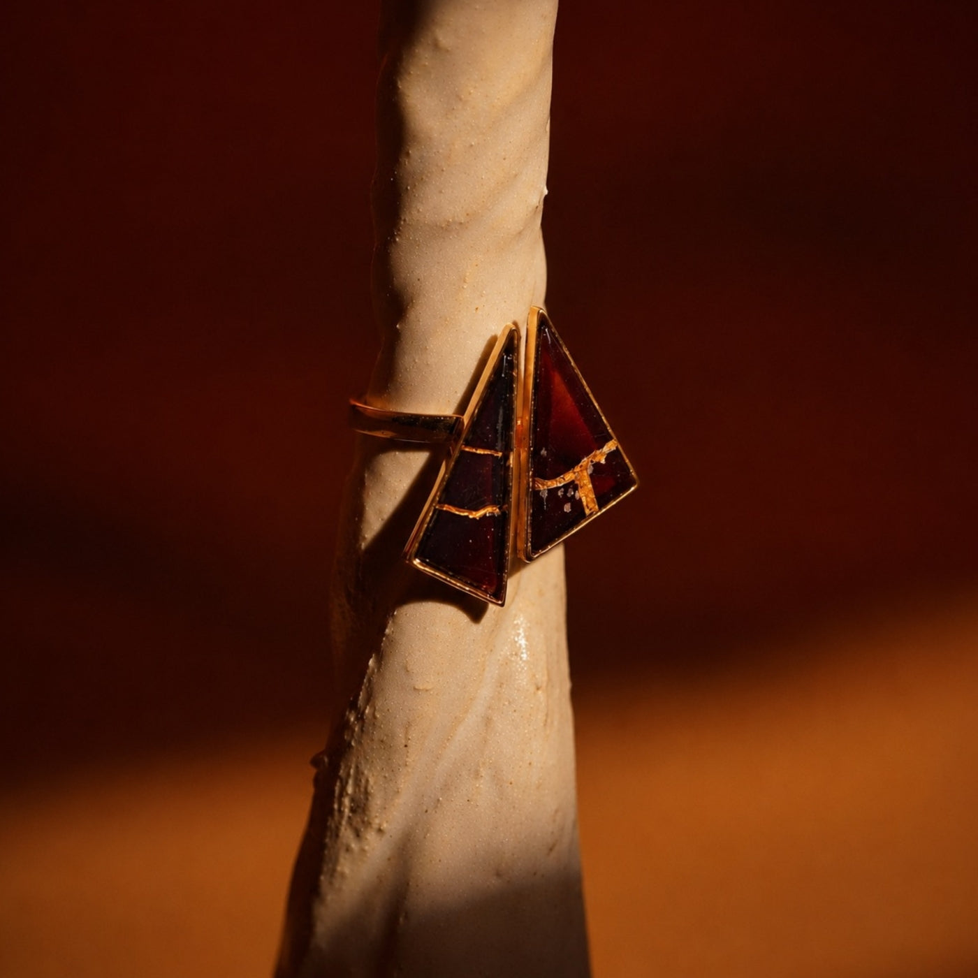 Shop Mhari Rings — a kintsugi-inspired ring with red enamel and gold in handcrafted silver