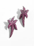 Pair of CZ ombre starfish stud earrings on white background