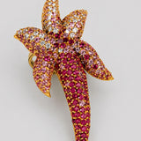 Starfish cocktail ring with hand-set AAA pink CZ ombré gradient in 24k gold, large front product shot.