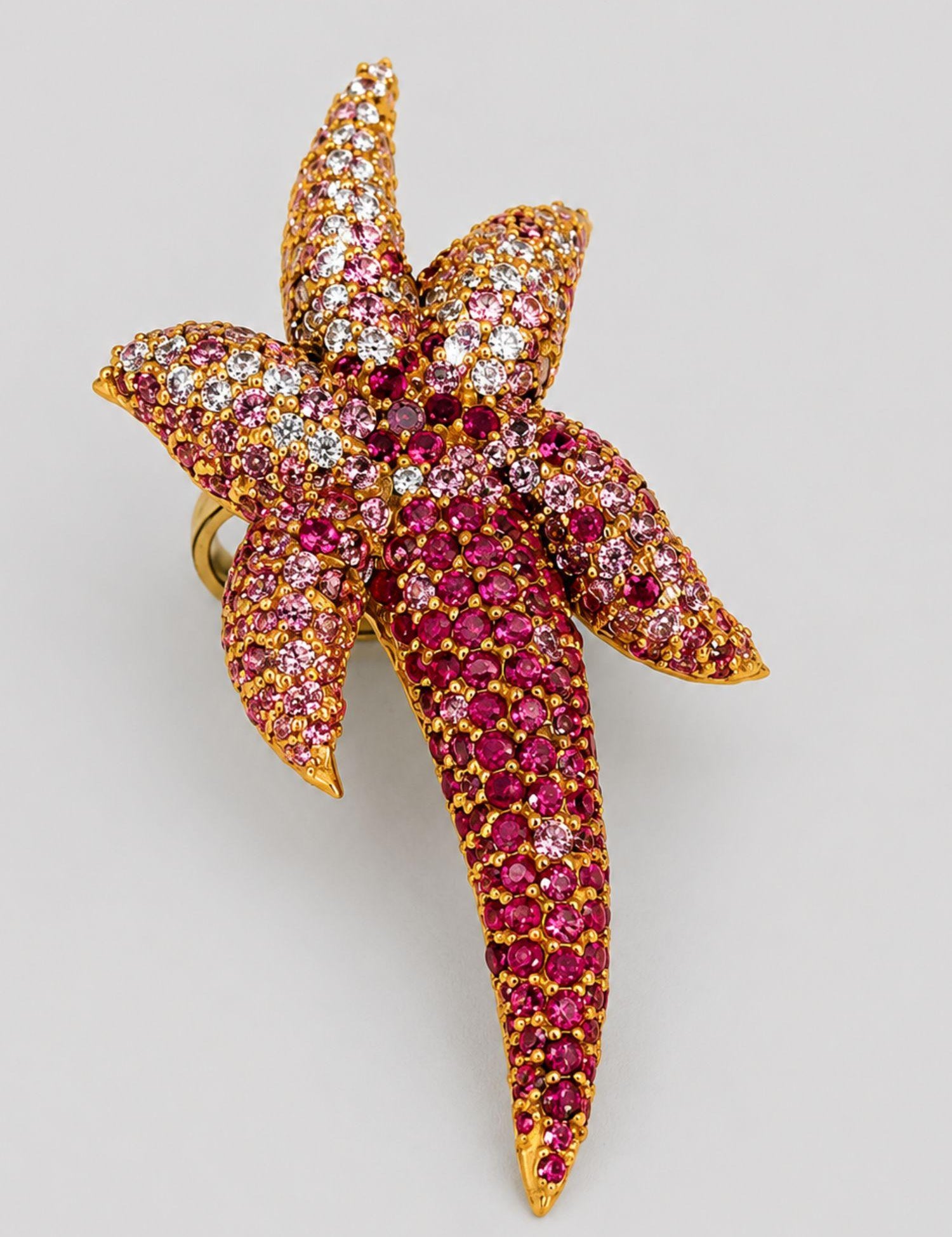 Starfish cocktail ring with hand-set AAA pink CZ ombré gradient in 24k gold, large front product shot.