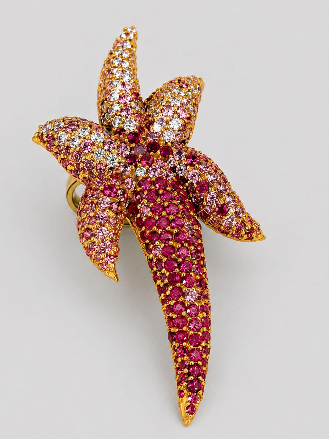 Starfish cocktail ring with hand-set AAA pink CZ ombré gradient in 24k gold, large front product shot.