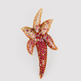 Starfish ring with AAA CZ ombré in 24k gold, front product shot showing full starfish form on neutral background.