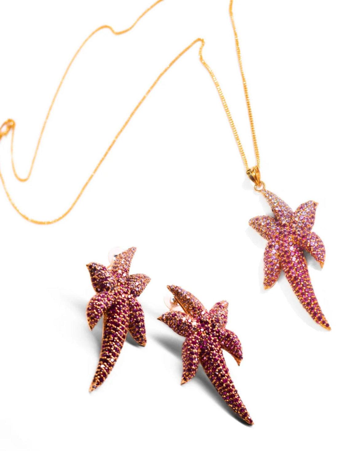 CZ ombre starfish pendant necklace and earring set on cream background
