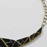 Tsugumi kintsugi collar necklace with chain clasp shown on neutral background, full piece visible.