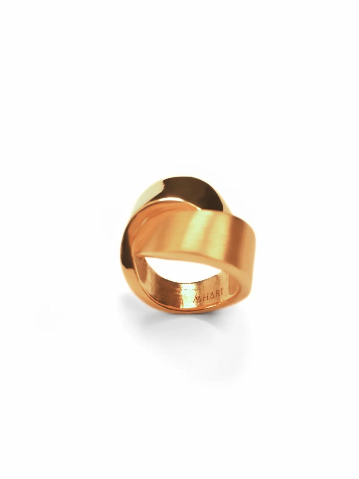 Wide-band gold ribbon ring with high polish finish, product shot on white