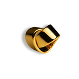 Sculpted gold ribbon cocktail ring with high polish finish on white background