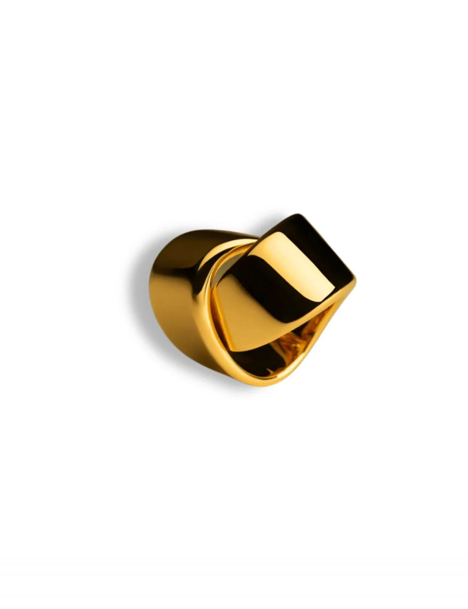 Sculpted gold ribbon cocktail ring with high polish finish on white background