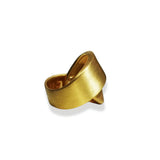 Matte finish gold ribbon ring showing sculptural form on white background